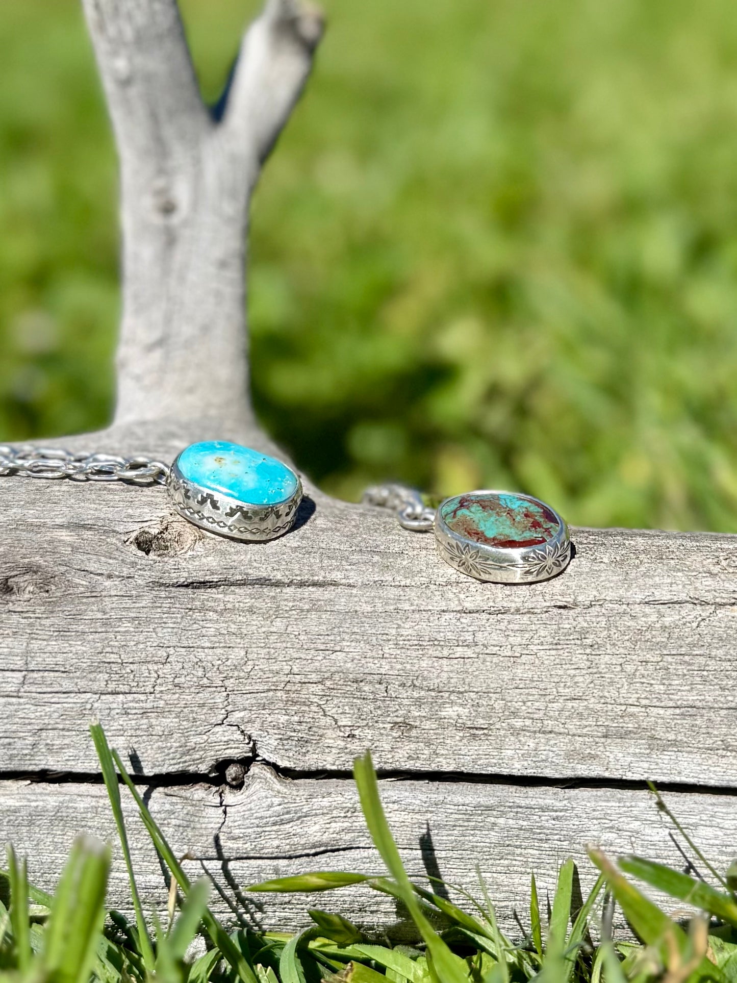 Close-up of natural Royston turquoise beads and sterling silver stamped bezel pendant, handmade artisan necklace shown with other similar necklace