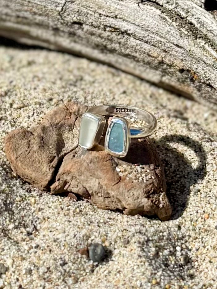 Back of white sea glass and abalone sterling silver ring showing handcrafted band and setting detail