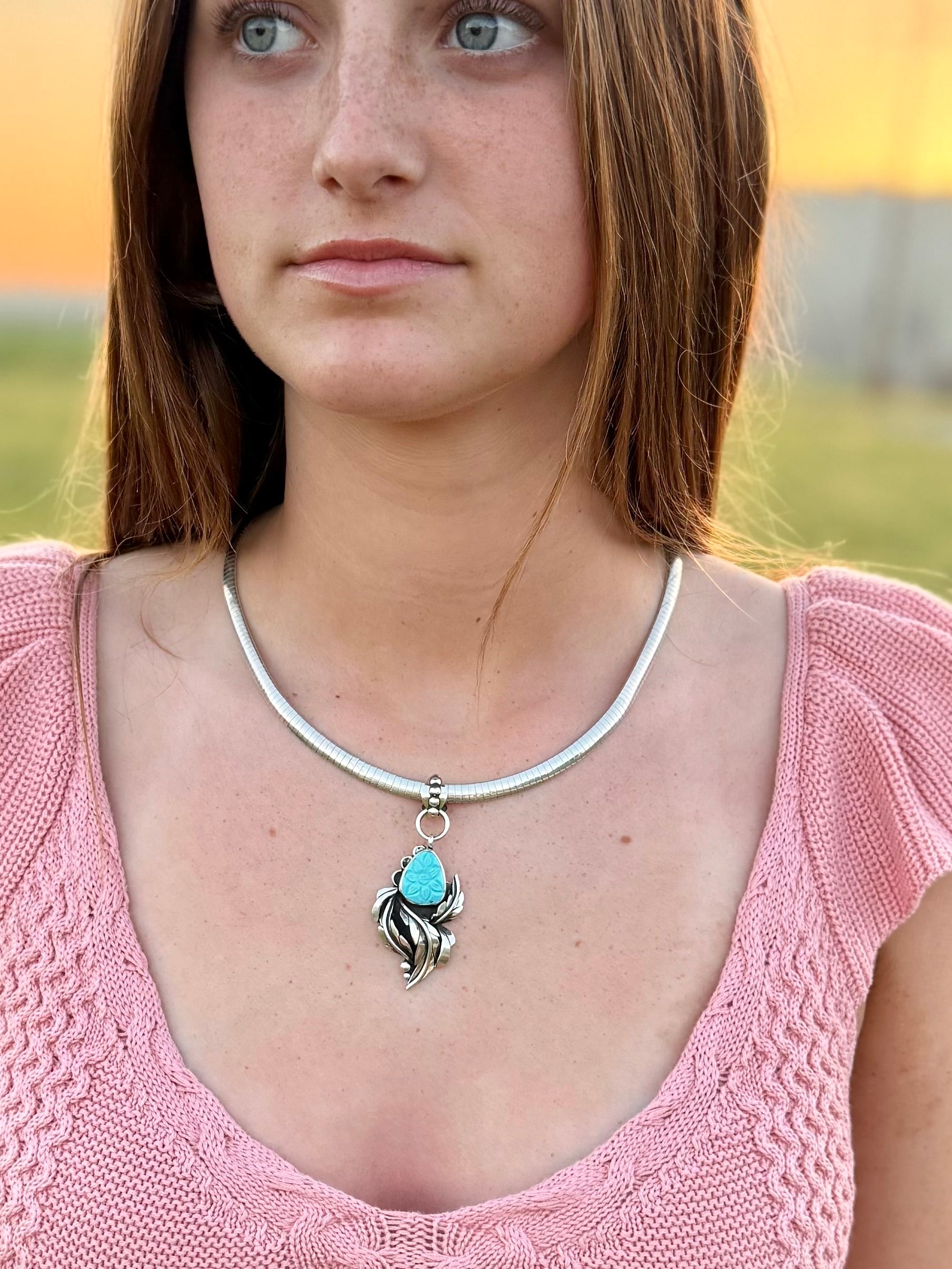 Hand Carved Persian turquoise necklace worn, boho western style jewelry