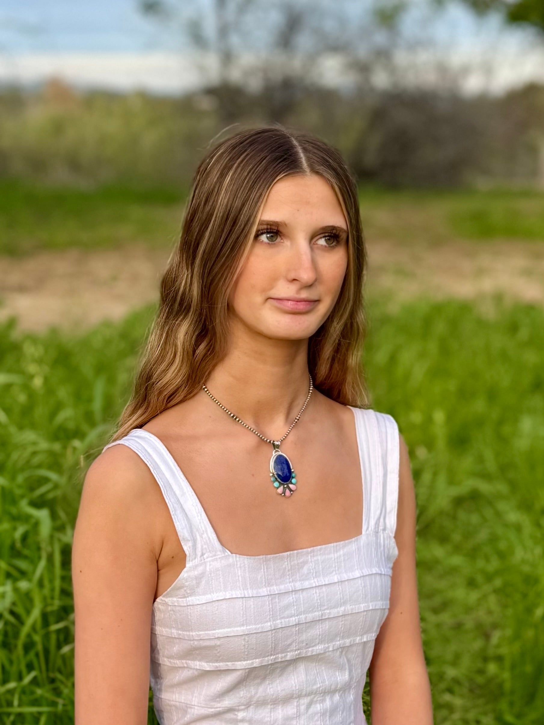 Multi-stone pendant worn with lapis, turquoise, and conch, boho western statement jewelry