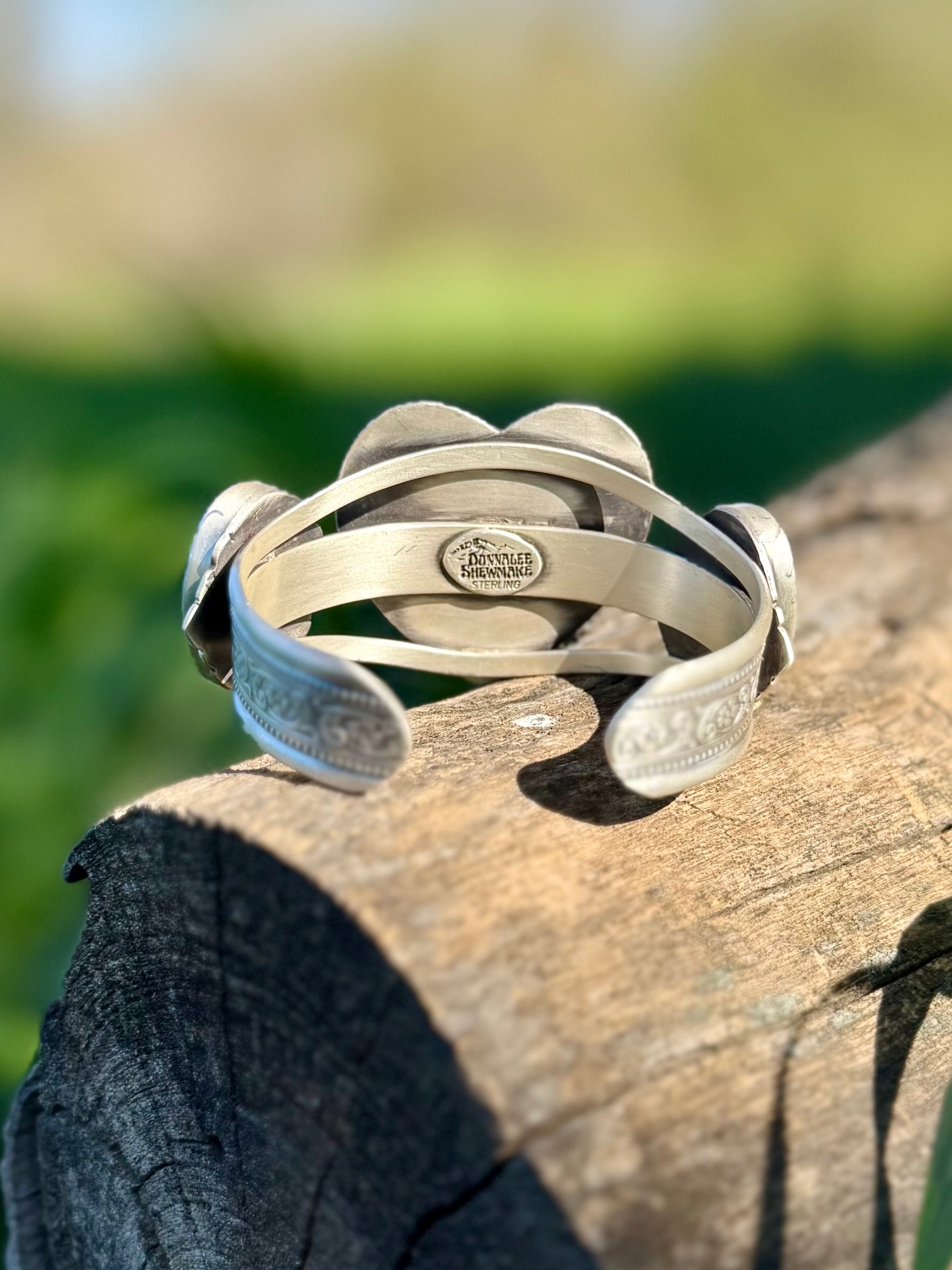 Back of sterling silver cuff bracelet showing handcrafted band detail