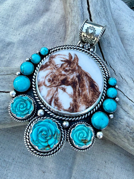 Close-up of turquoise stone and horse design showing handcrafted detail