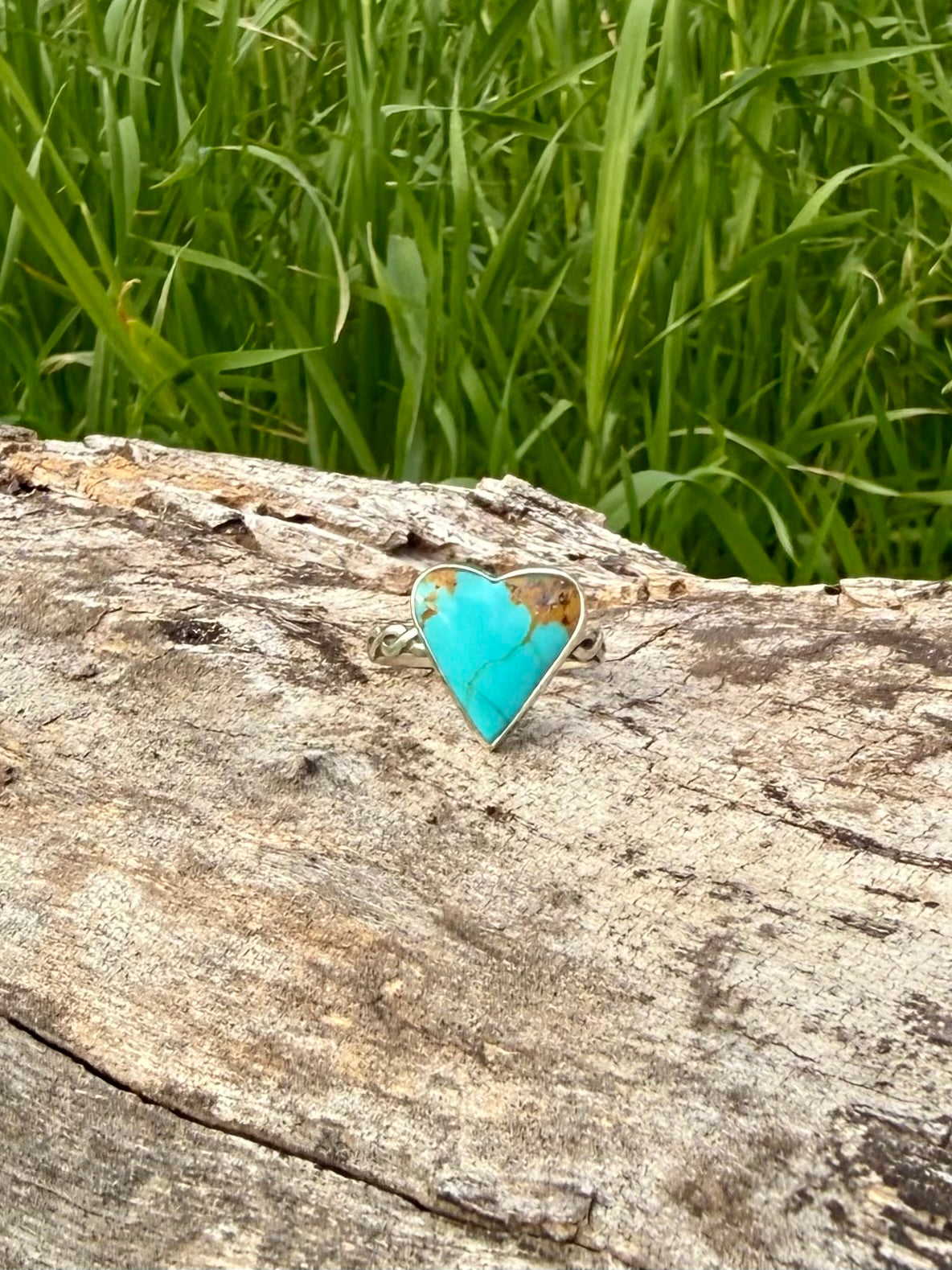 Close-up of blue Royston turquoise showing natural matrix and heart shape