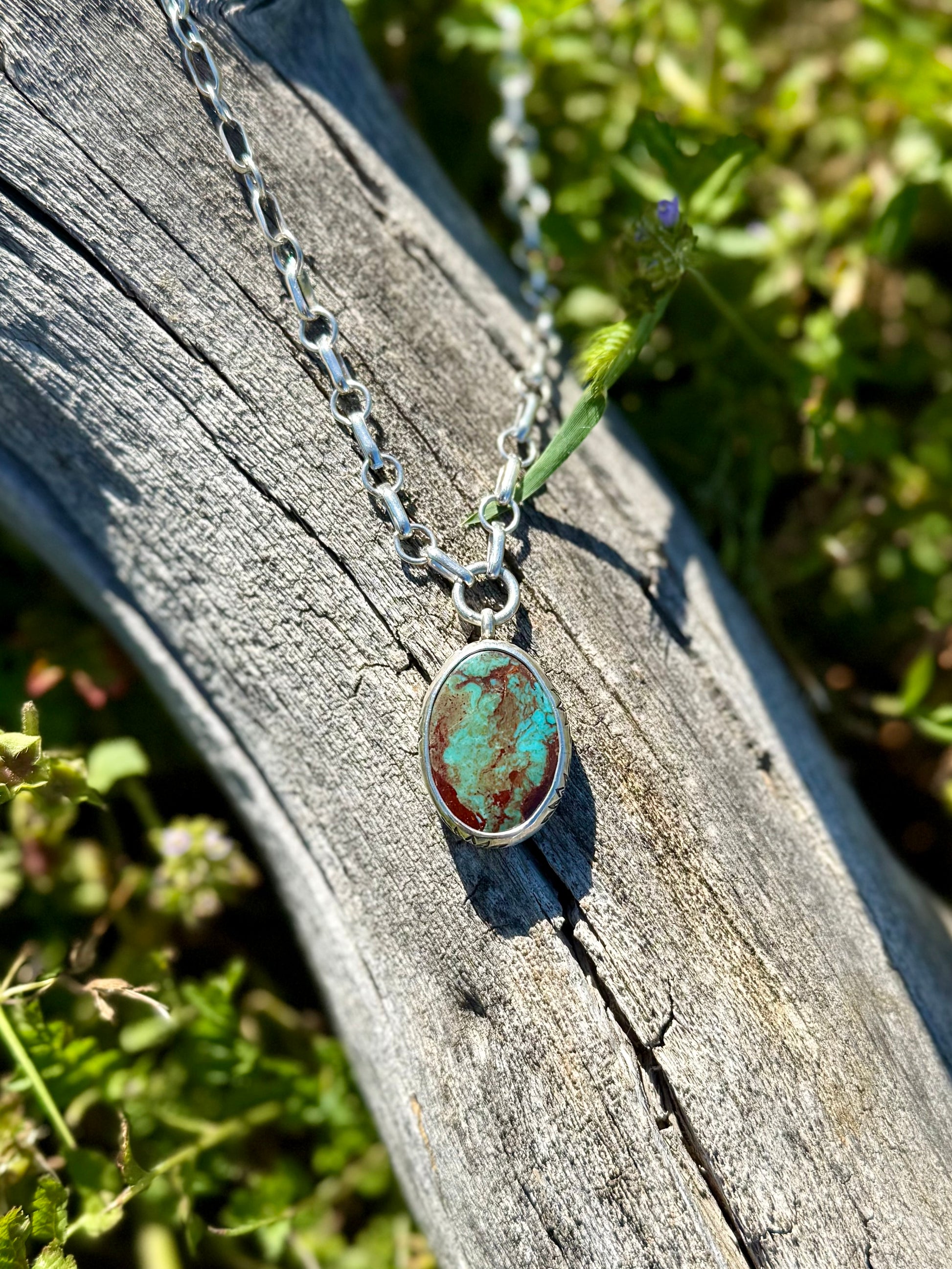 Sterling silver pendant with stamped bezel setting featuring natural Royston turquoise stone, handcrafted boho western jewelry