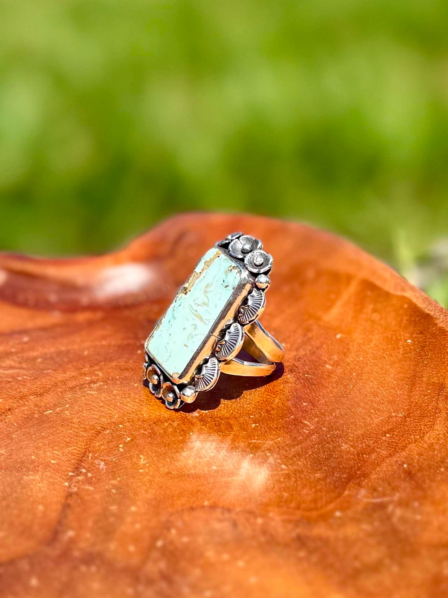 Handmade sterling silver Dry Creek Turquoise statement ring with rectangular natural turquoise stone showing band