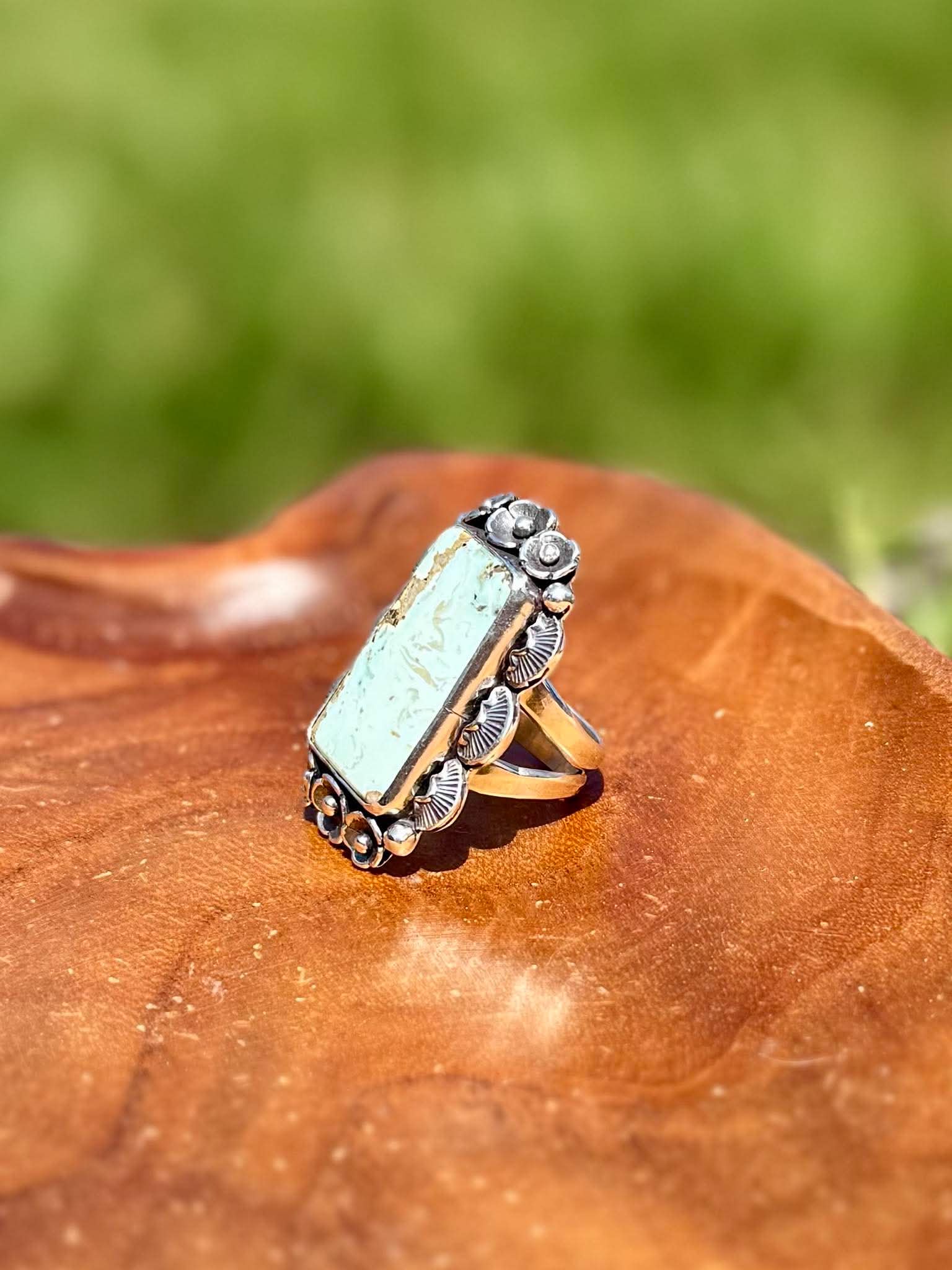 Handmade sterling silver Dry Creek Turquoise statement ring with rectangular natural turquoise stone showing band