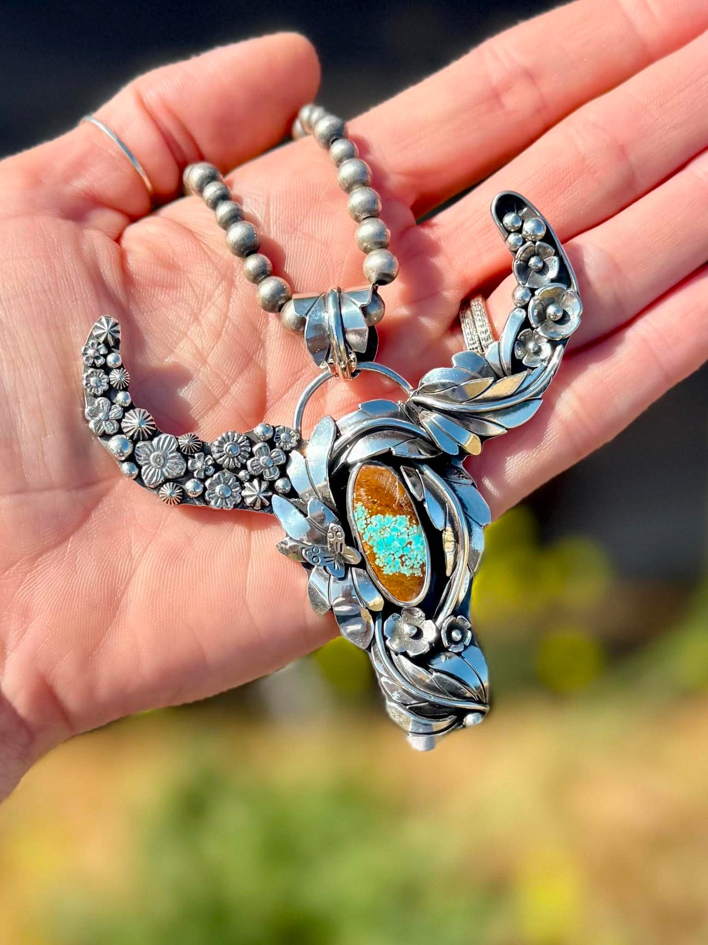 Handmade sterling silver longhorn pendant with Mine 8 turquoise floral western statement jewelry