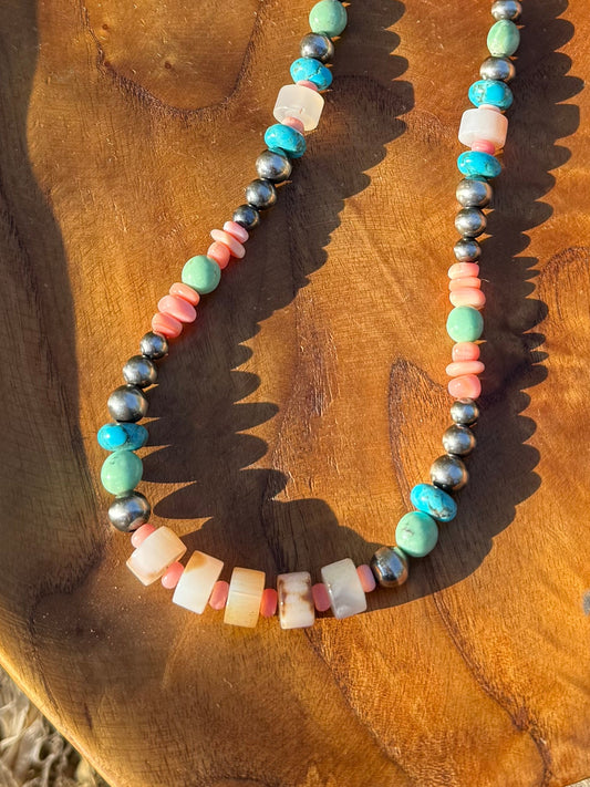Close up of Montana Agate beads with Kingman turquoise Variscite Pink Conch and sterling silver pearls