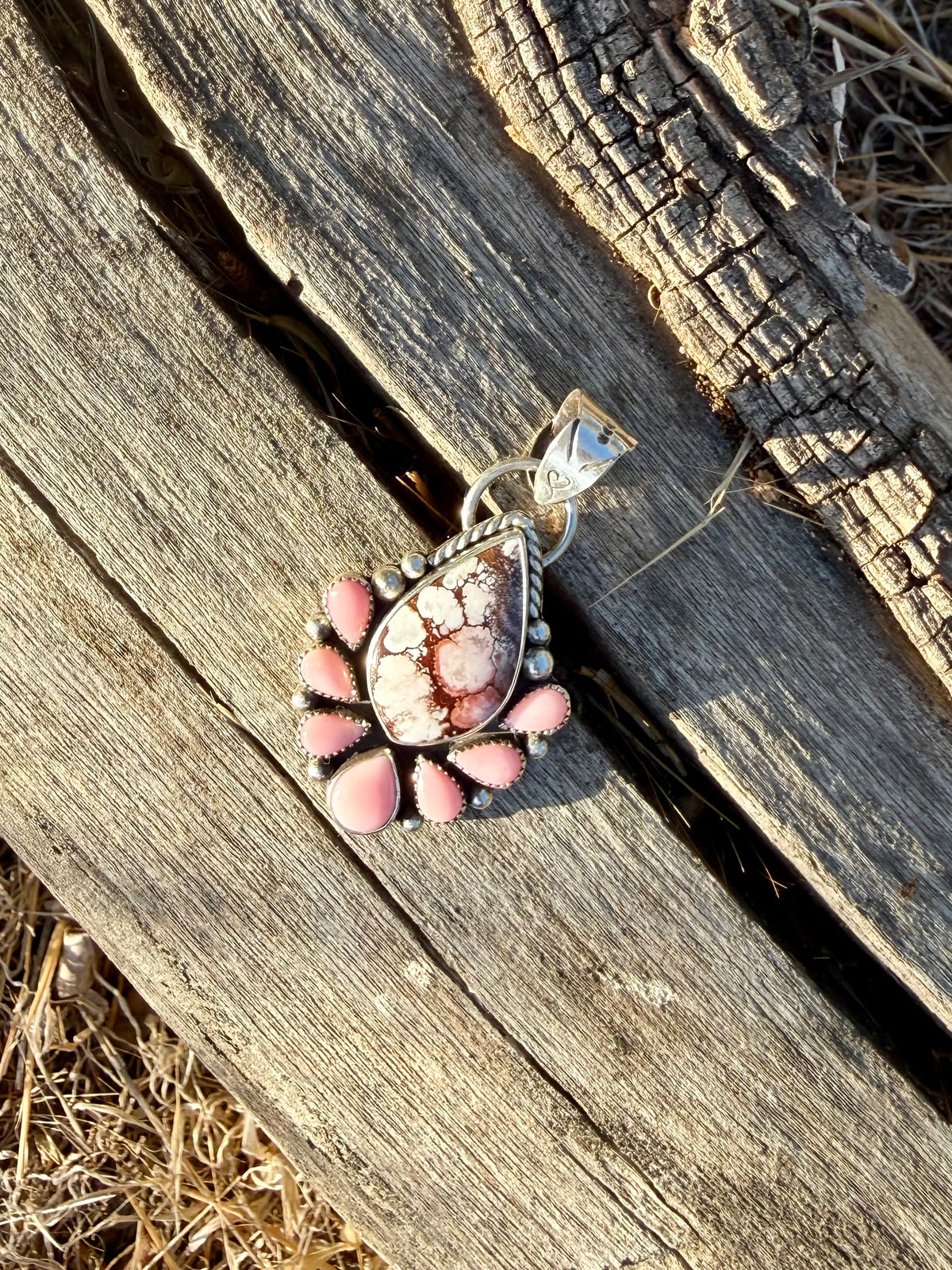 One-of-a-kind Wild Horse stone pendant surrounded by Pink Conch and handcrafted in sterling silver by Donnalee Silver