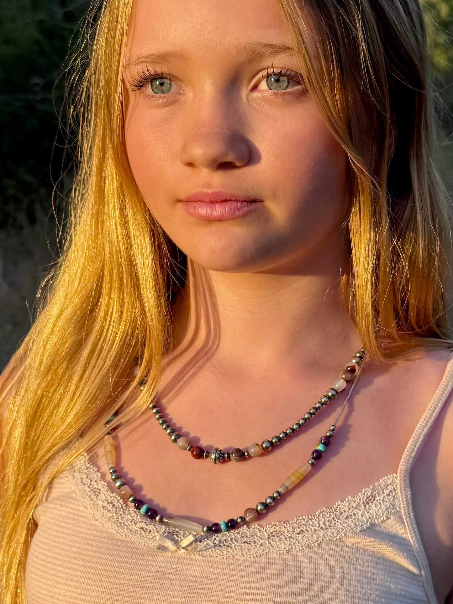 20 inch Montana agate petrified wood and sterling silver pearl necklace worn on model