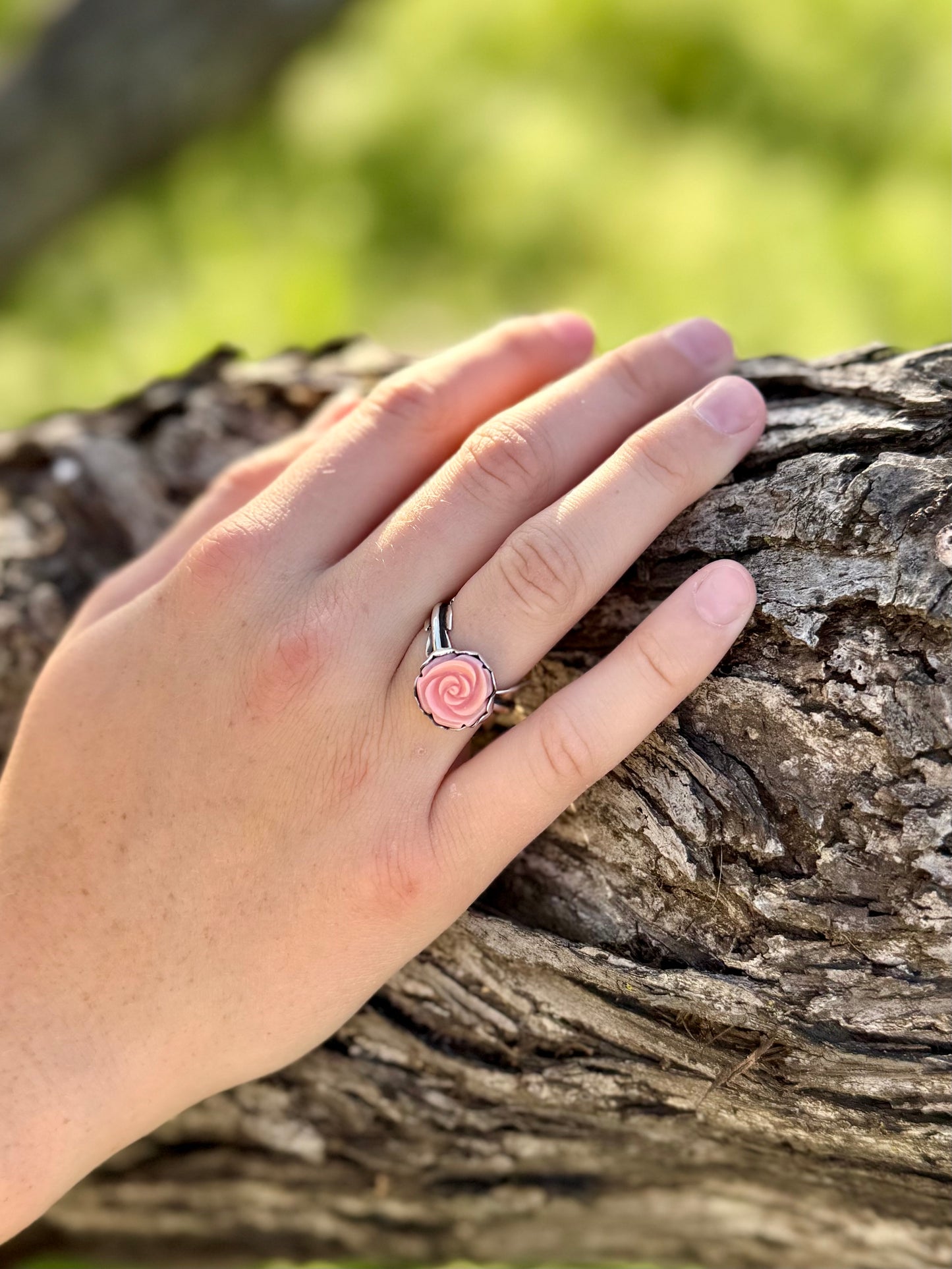 Pink conch rose leaf ring in sterling silver with soft blush pink stone and floral design