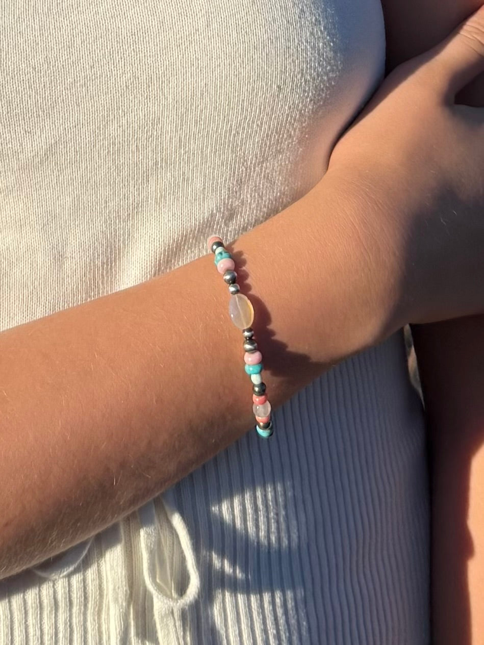 Western gemstone bracelet with Pink Conch turquoise Montana Agate and sterling silver pearls