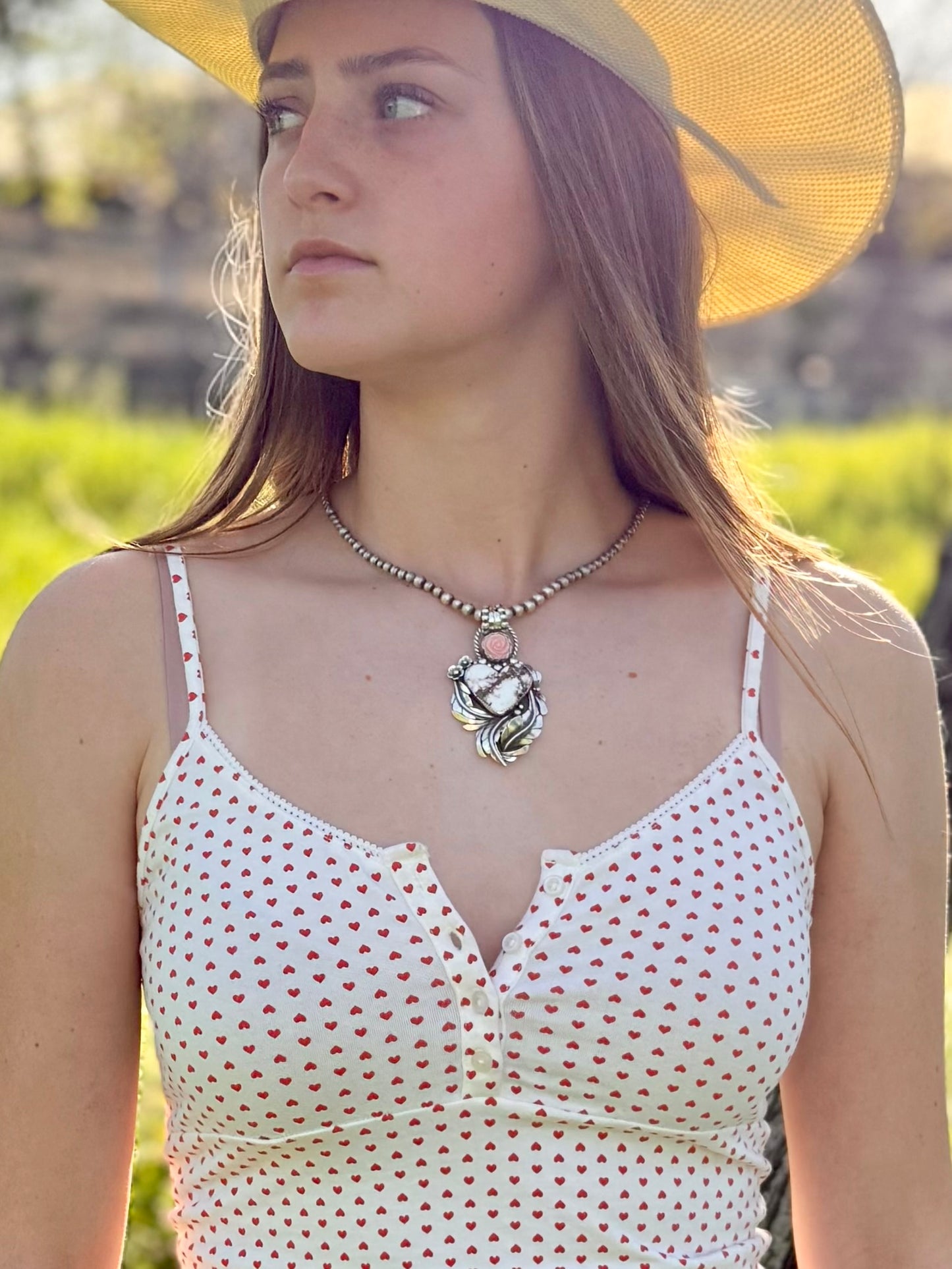 Wildhorse and pink conch heart necklace worn, boho western statement jewelry
