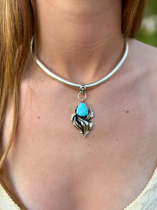 Persian turquoise pendant in sterling silver with vivid sky blue stone