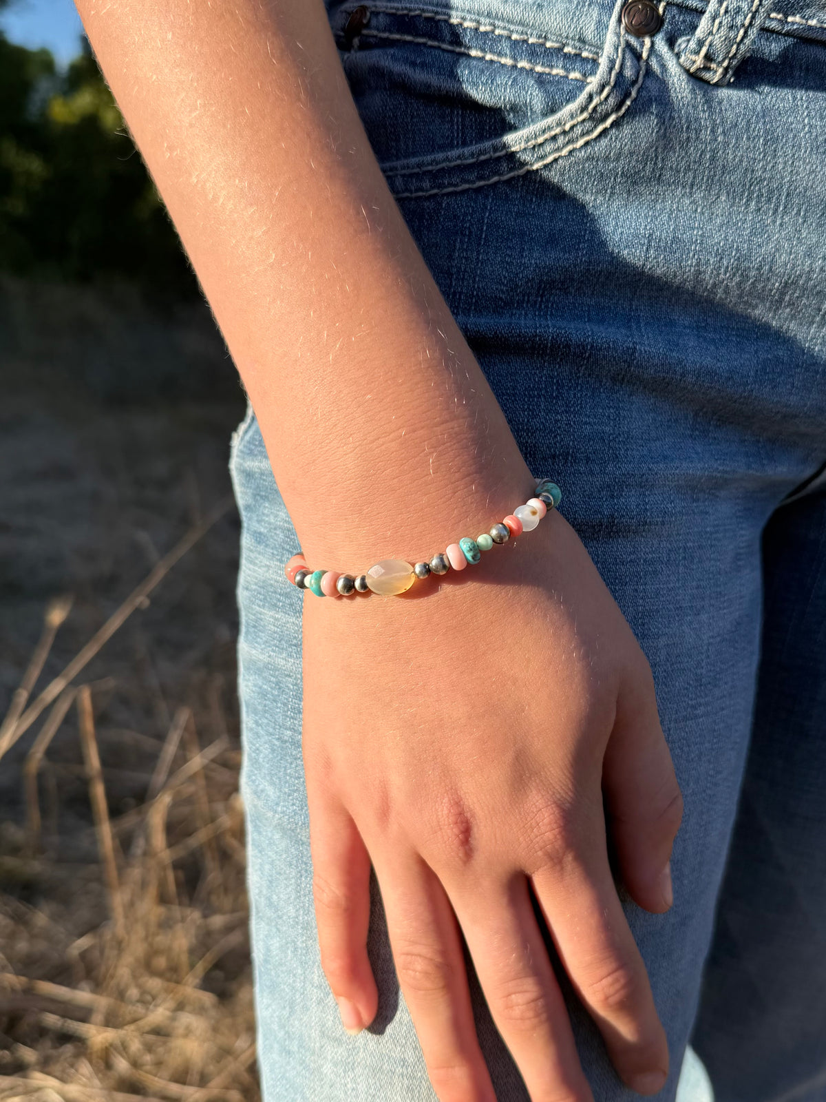 Handmade Montana Agate and Kingman turquoise beaded bracelet with Pink Conch