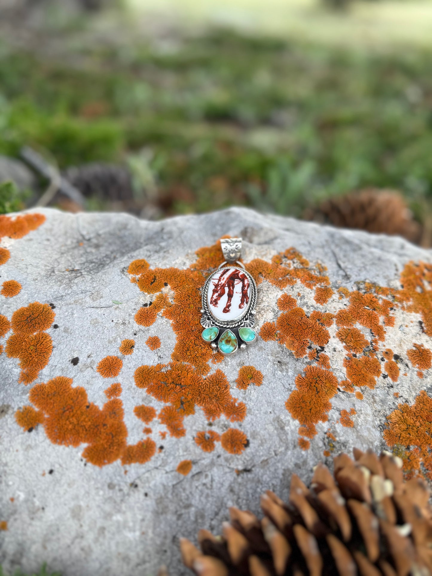 Porcelain horse pendant with three Kingman Turquoise stones handcrafted in sterling silver by Donnalee Silver.