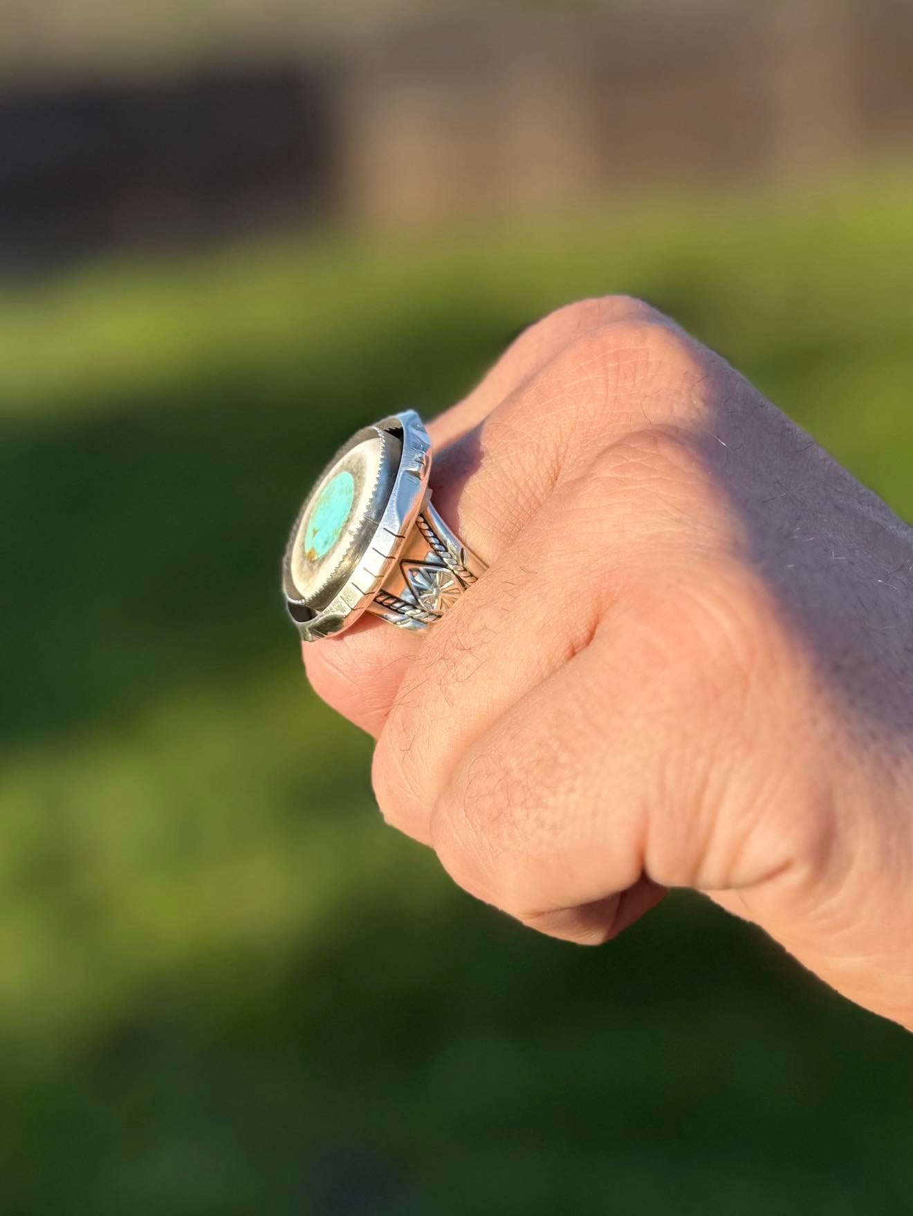 Sterling silver deer antler ring with turquoise inlay showing side profile and band detail