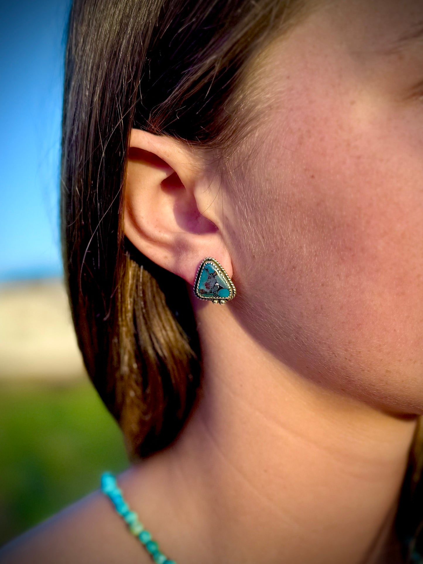Mojave Dahlia turquoise stud earrings worn, colorful boho western jewelry