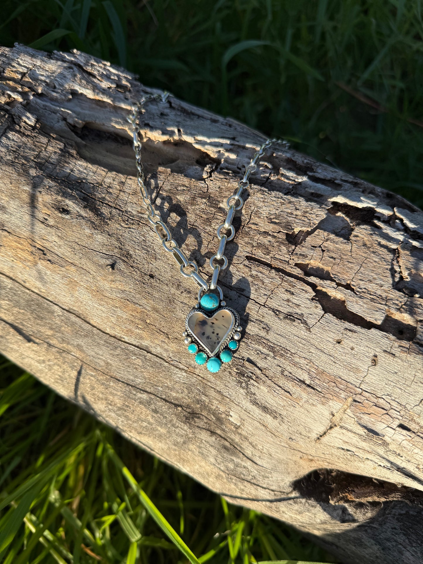 Close-up of Montana agate showing natural patterns with bright blue Kingman turquoise