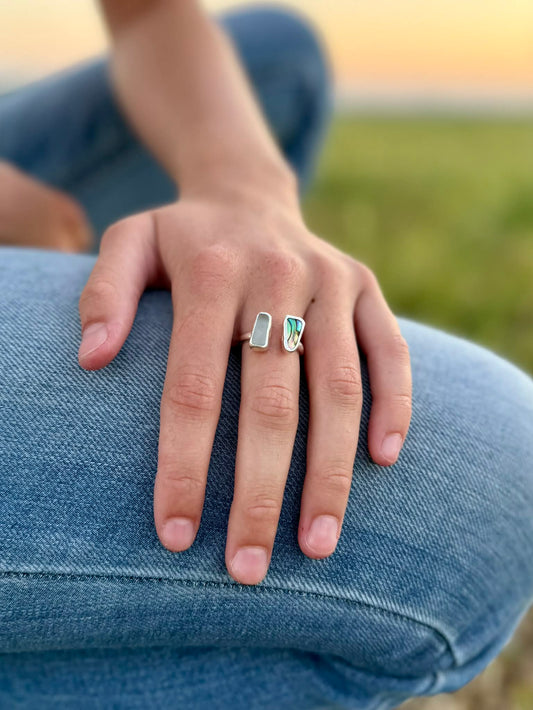 Abalone and sea glass ring worn on hand, showing colorful Abalone  iridescent colors coastal boho statement jewelry 