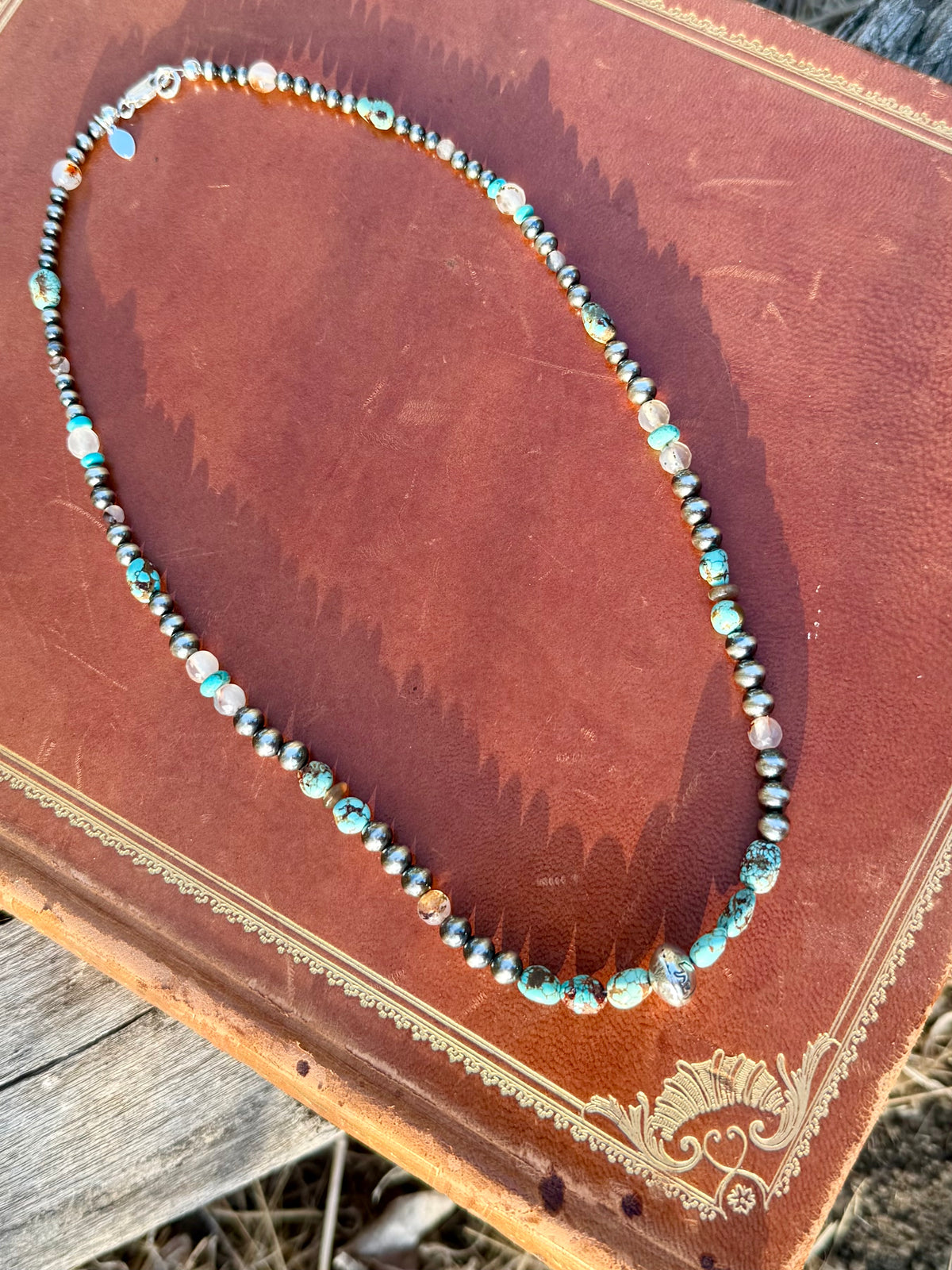 Handmade Mine 8 turquoise and Montana Agate necklace with sterling silver beads from the Montana Collection
