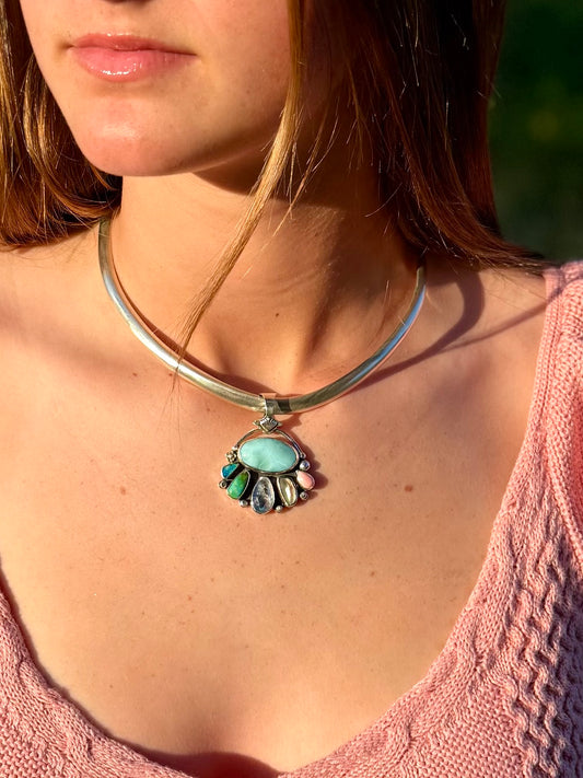 Larimar and opal pendant in sterling silver with ocean blue tones and iridescent color