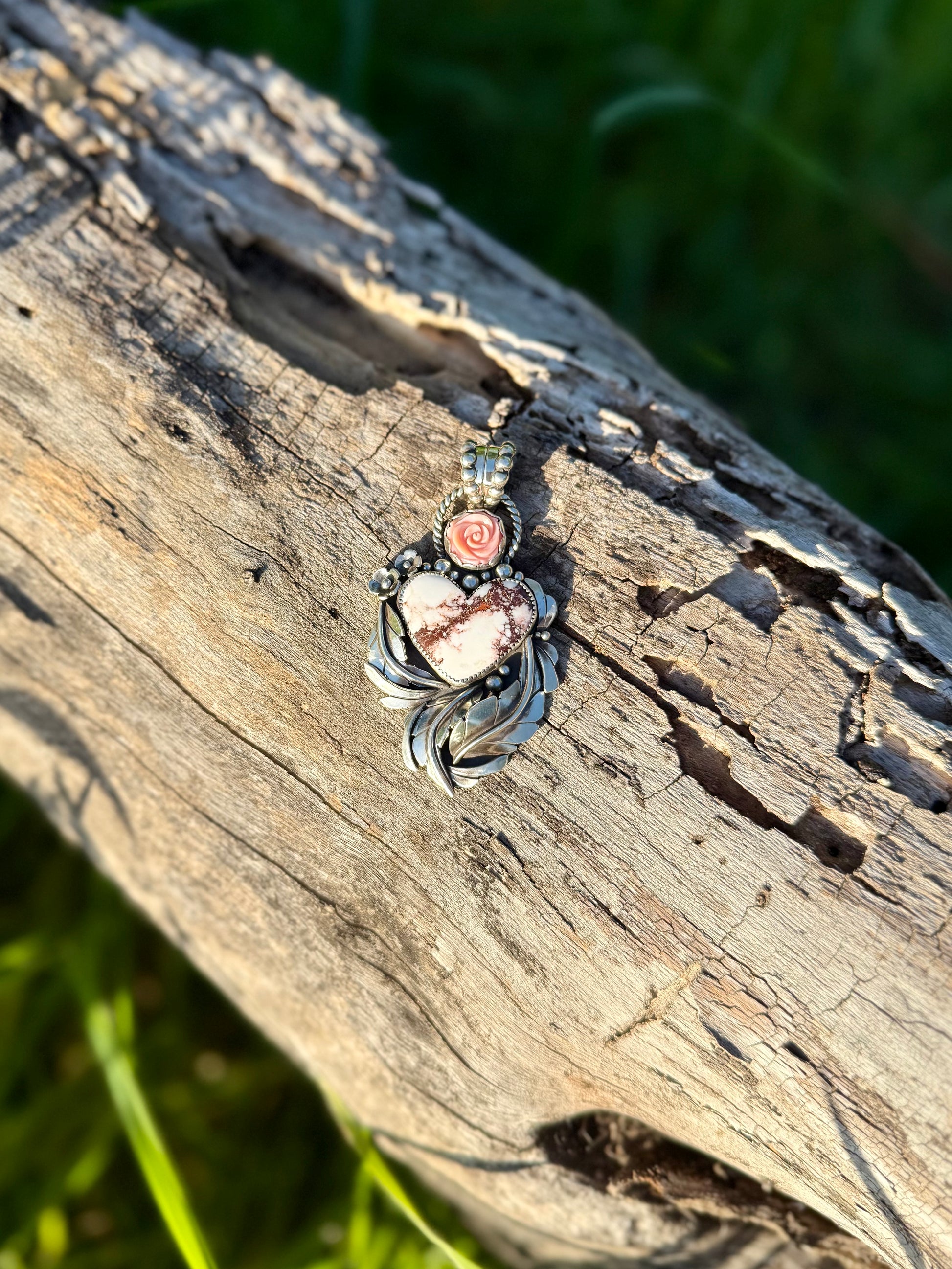 Close-up of Wildhorse stone showing brown and white pattern with pink conch detail