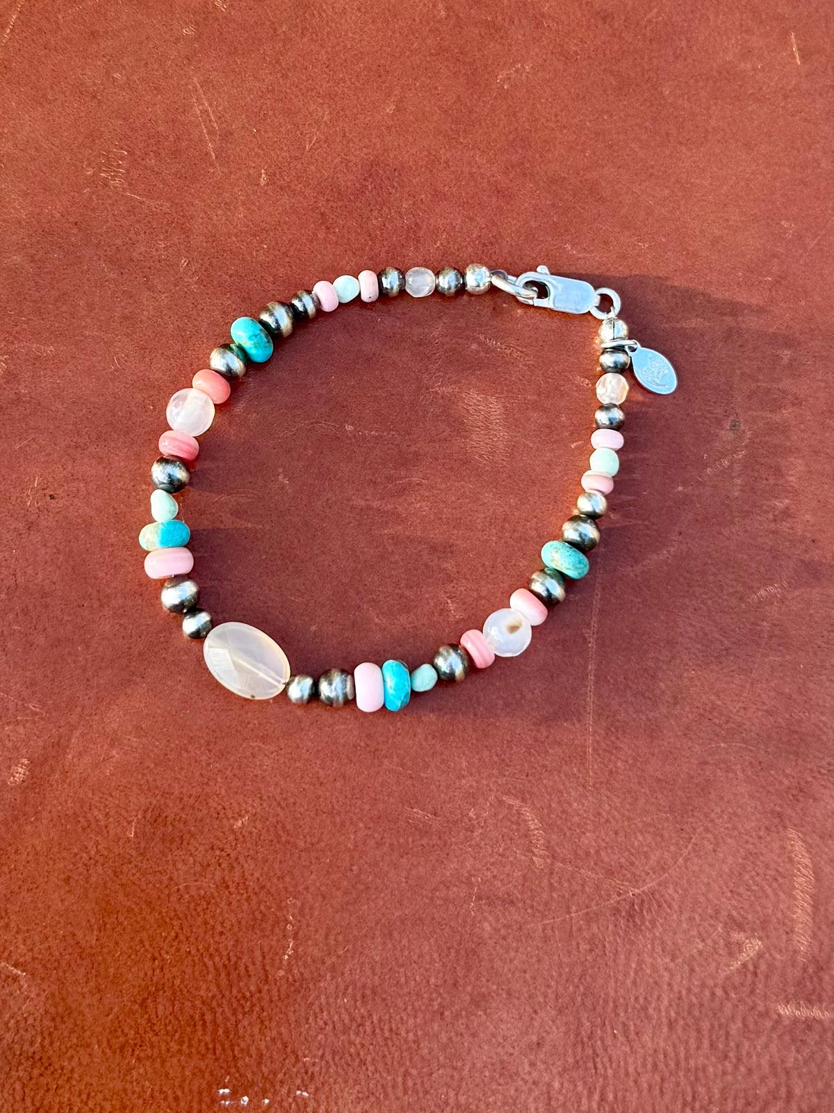 Montana Agate Kingman turquoise Pink Conch and sterling silver pearl bracelet handmade by Donnalee Silver