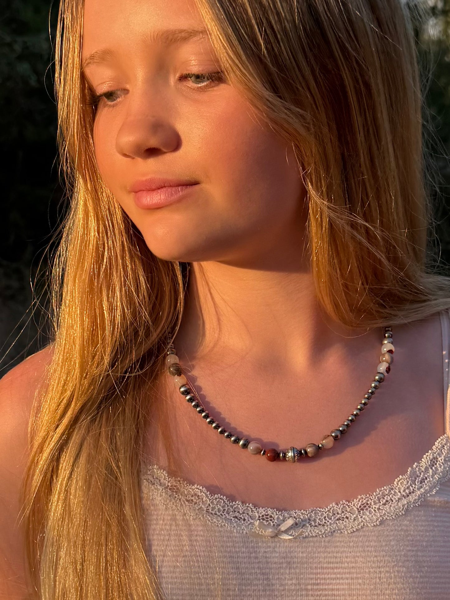 20 inch Montana agate petrified wood and sterling silver pearl necklace worn on model
