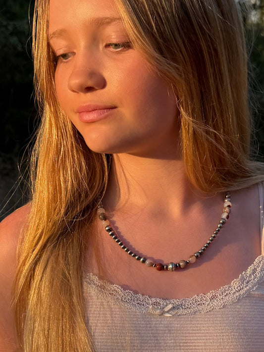 20 inch Montana agate petrified wood and sterling silver pearl necklace worn on model