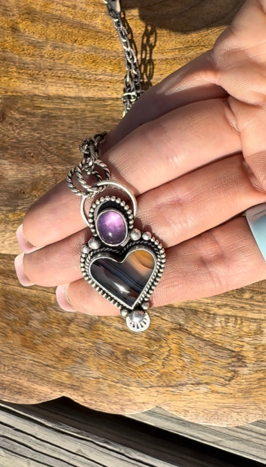 Handmade sterling silver necklace with purple Amethyst and heart-shaped Montana Agate pendant by Donnalee Silver.