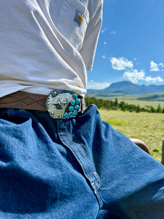 Donnalee Silver Ithaca Peak Turquoise hand engraved elk western belt buckle from the Montana Collection.