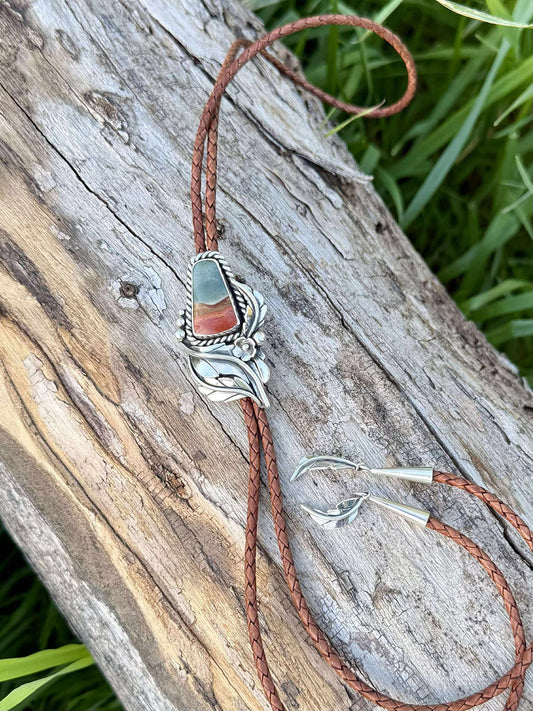 Full bolo tie showing braided cord, stone setting, and silver tips