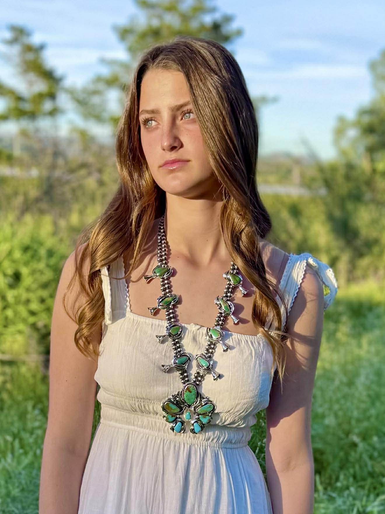 Royston turquoise ombre squash blossom necklace in sterling silver with blue to green gradient stones