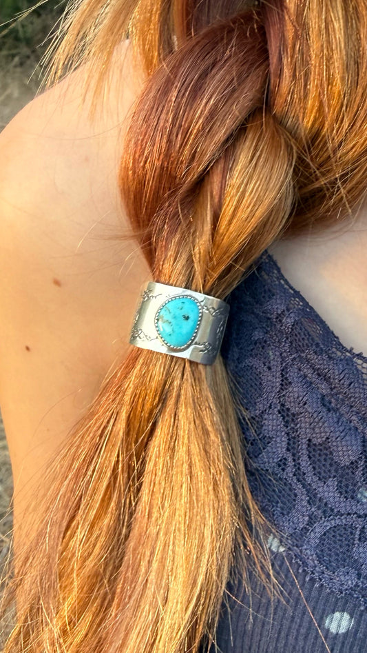 Kingman Turquoise sterling silver braid cover worn in blonde braid, handmade by Donnalee Silver.