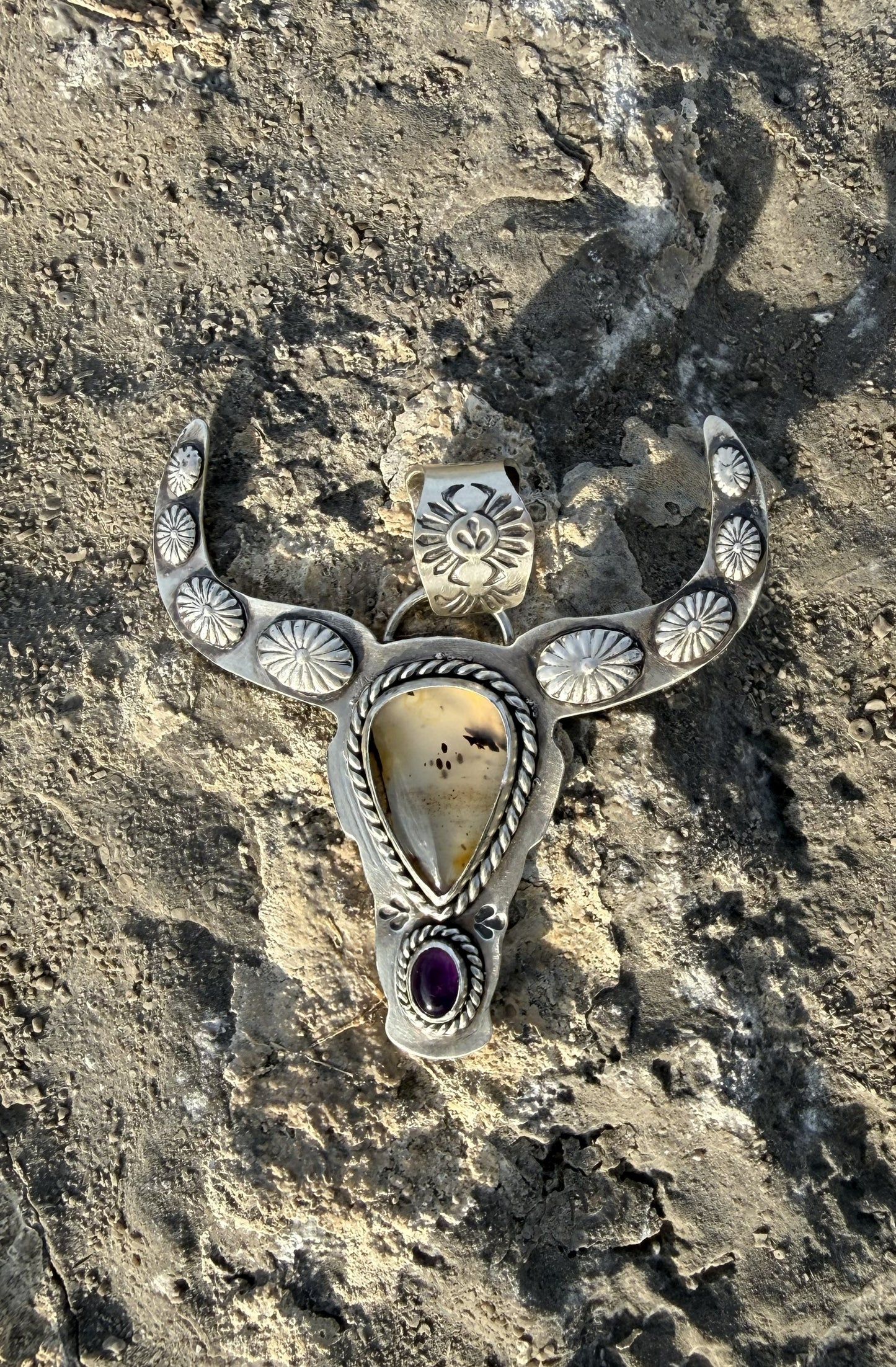 Handmade sterling silver longhorn pendant featuring scenic Montana Agate and Amethyst with handcrafted concho details.